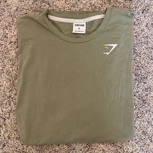 Light green colored short sleeve Gymshark tee, size XL